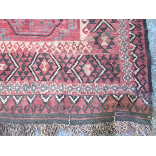 283 - Large red ground Kelim rug, 280cm x 200cm