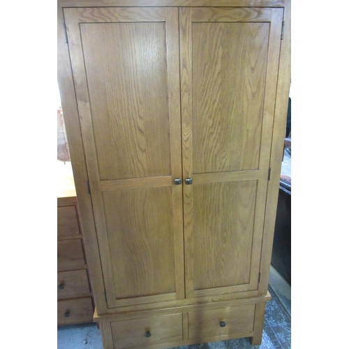 632 - Oak 'Dorset' five piece bedroom suite comprising, pair of wardrobes with two doors above drawers, W1... 