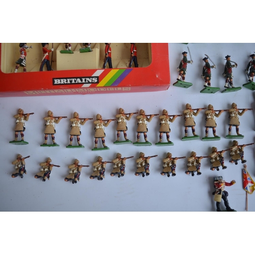 143 - Collection of non articulated toy soldiers, mostly metal cast from W Britain's but also some Britain... 