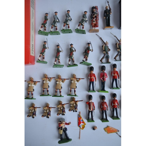 143 - Collection of non articulated toy soldiers, mostly metal cast from W Britain's but also some Britain... 