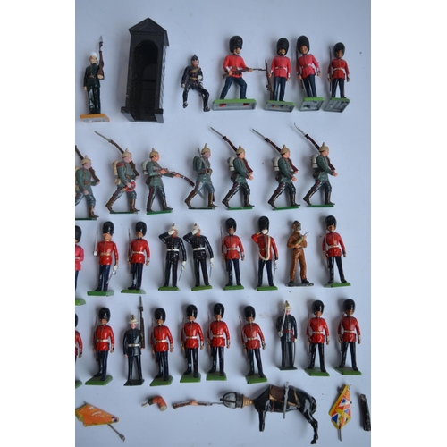 143 - Collection of non articulated toy soldiers, mostly metal cast from W Britain's but also some Britain... 