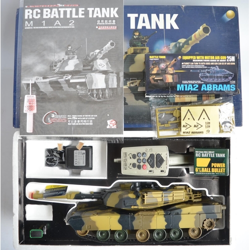 151 - Radio controlled BB firing M1A2 Abrams tank model (with attached factory tag, full complement of pla... 