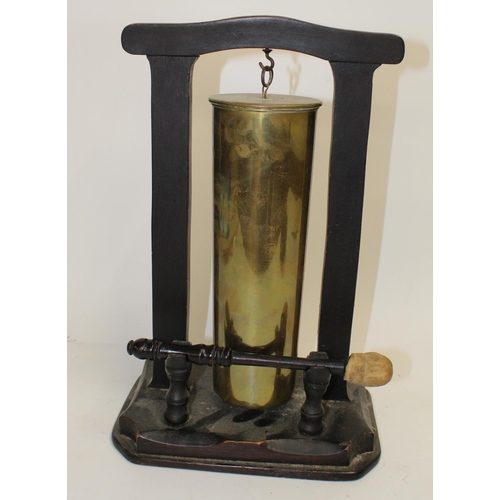 682 - Dinner gong made from WWI shell case with wooden frame  Hight 41cm