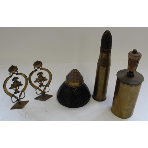 684 - Trench art paper weight made from a German nose cone, inert .37.02 round, Trench art bell, pair of b... 