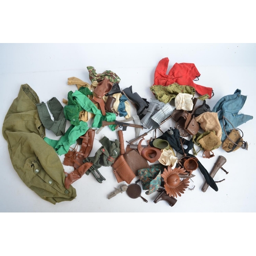 164 - Large collection of Action Man accessories, clothing and other related items. Qty