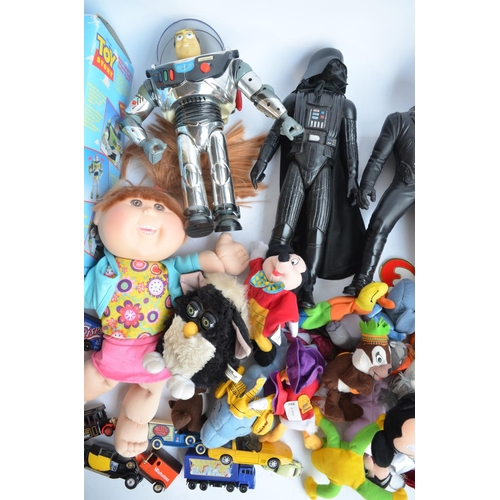 166 - Collection of toys to include 2x Buzz Lightyear figures (1 boxed), a Furbee, TY Beanie Babies and Mc... 