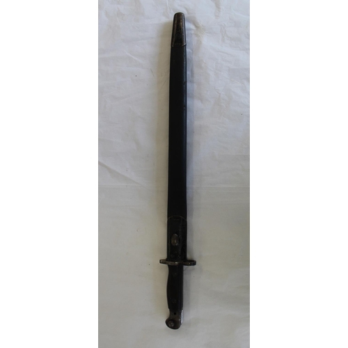 694 - WWI 1907 pattern SMLE sword bayonet in original leather scabbard with markings on the ricasso. Blade... 