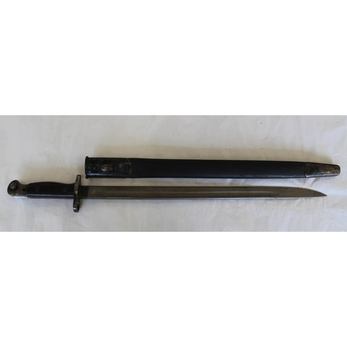 694 - WWI 1907 pattern SMLE sword bayonet in original leather scabbard with markings on the ricasso. Blade... 