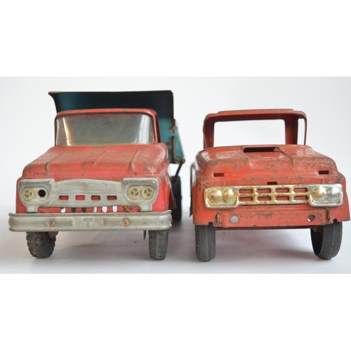 169 - Two vintage pressed steel pick up truck models to include a Tonka Toys dump truck (in working order)... 