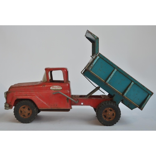 169 - Two vintage pressed steel pick up truck models to include a Tonka Toys dump truck (in working order)... 