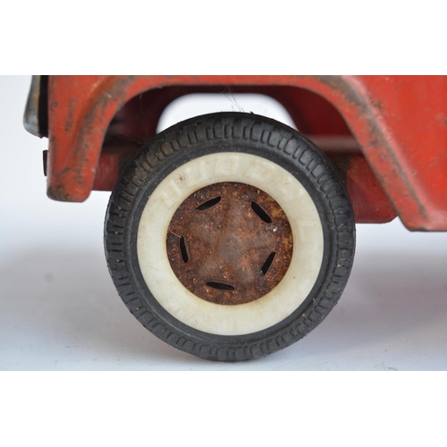 169 - Two vintage pressed steel pick up truck models to include a Tonka Toys dump truck (in working order)... 