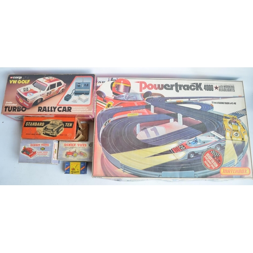 173 - Collection of car models and games to include vintage Matchbox Le Mans Powertrack 4000 slot car set ... 