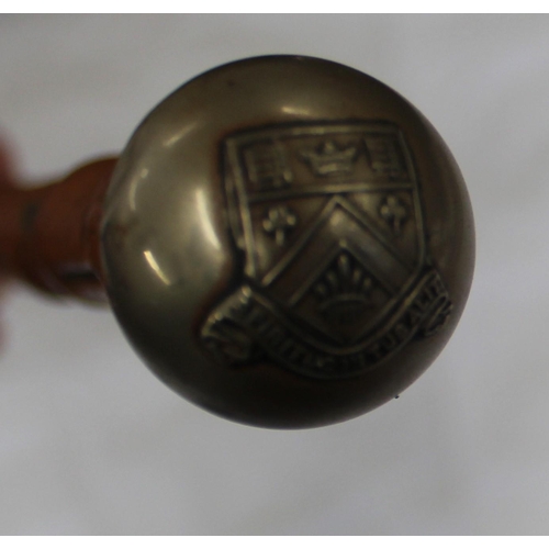 704 - Bamboo Swagger stick with top baring the coat of arms for Clifton College 'Spiritus- Intus- Alit'. T... 