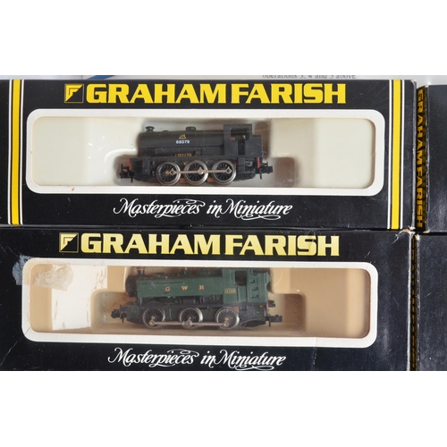 182 - Collection of N gauge railway locos, wagons and accessories to include Graham Farish No 1104 9400 GW... 