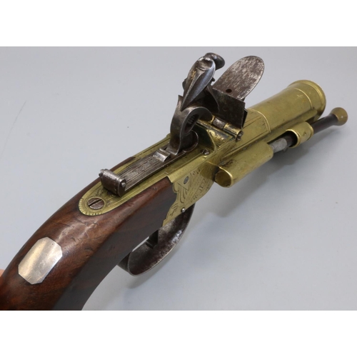 603 - W.Parker of Holborn London Flintlock coat pistol, with brass action and staged cannon barrel with sl... 