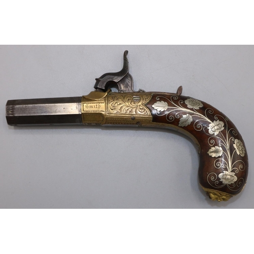 610 - Smith of London percussion cap pocket pistol, with semi round brass action elaborately decorated wit... 