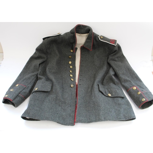 724 - WWI era Imperial German re-enactors uniform. Includes; cap, tunic,2 pair of  trousers, and tee-shirt... 