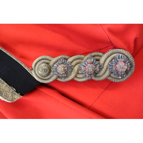 726 - Captain of the Kings Own Regiment Of Yorkshire Scarlet Tunic. With Regimental buttons collar badges ... 