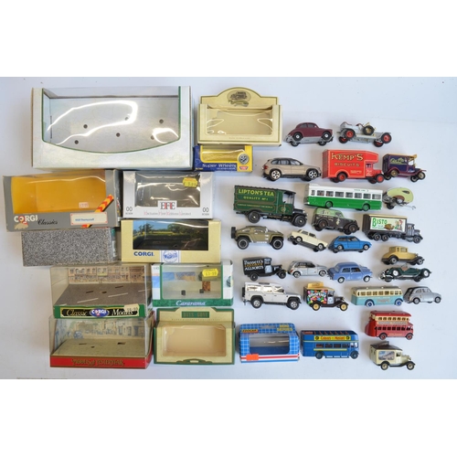 219 - Collection of diecast model vehicles, boxed and unboxed (plus empty boxes) to include Lledo Days Gon... 