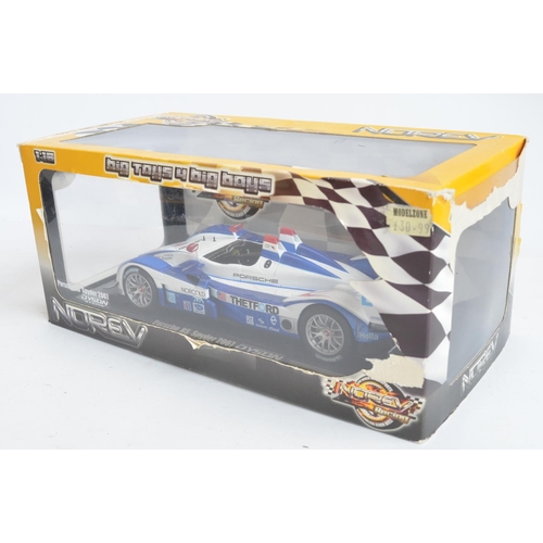 259 - Three boxed 1/18 scale diecast car models by Norev to include Alpine Renault A442 Le Mans 1978, Pors... 