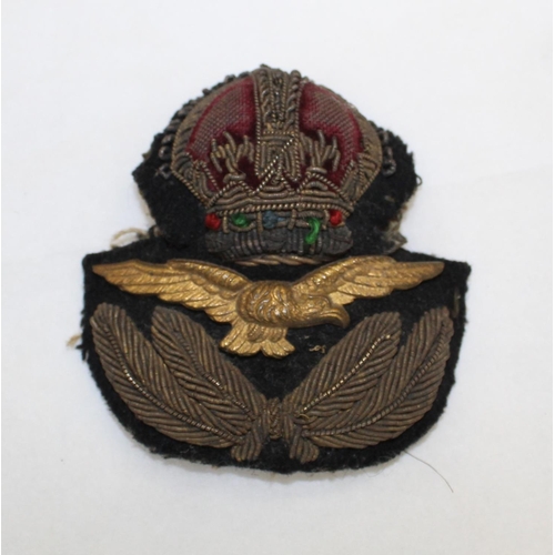 733 - Large collection of cloth patches and brass badges; RAF cap badges shoulder insignia , Royal Flying ... 