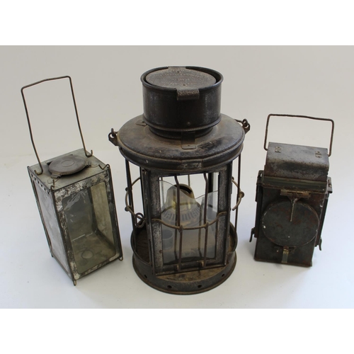 736 - Parkinson and Cowen large railway lamp Dated 1017. Military Railway Guards  hand lamp and a night wa... 