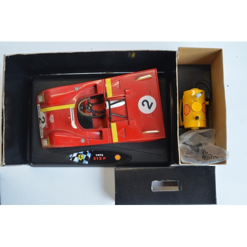 263 - Three boxed 1/18 scale highly detailed diecast car models to include Shell Collection Ferrari 1972 3... 