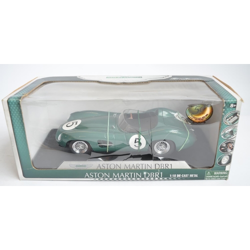 264 - Four boxed 1/18 scale highly detailed diecast Aston Martin models to include Shelby Collectables 50t... 