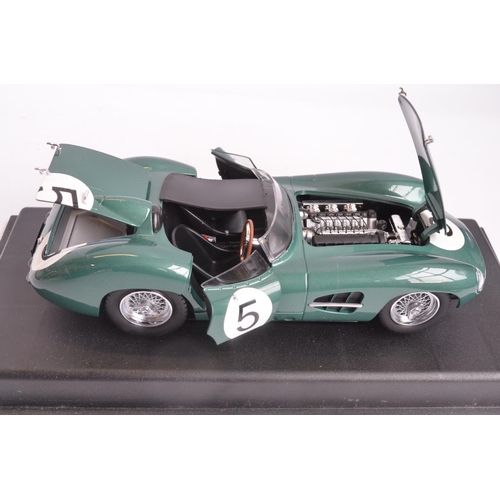 264 - Four boxed 1/18 scale highly detailed diecast Aston Martin models to include Shelby Collectables 50t... 