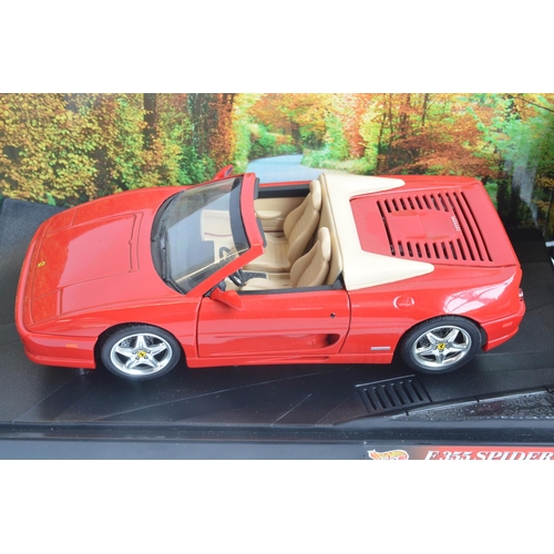 267 - Three Hot Wheels 1/18 scale highly detailed diecast Ferrari models to include Dino 246 GTS (54601, m... 