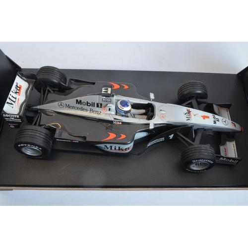 275 - Two boxed Minichamps (Paul's Model Art) 1/18 scale diecast McLaren Collection Mika Hakkinen F1 MP4 m... 