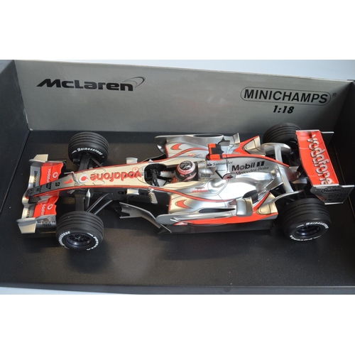 276 - Two boxed Minichamps (Paul's Model Art) 1/18 scale diecast McLaren Mercedes MP4 models to include Vo... 