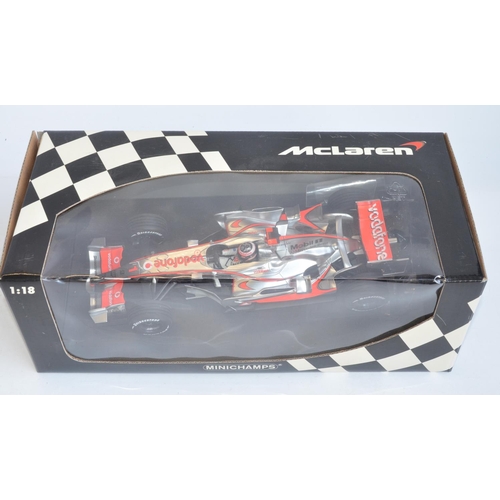 276 - Two boxed Minichamps (Paul's Model Art) 1/18 scale diecast McLaren Mercedes MP4 models to include Vo... 