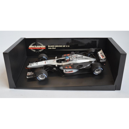 276 - Two boxed Minichamps (Paul's Model Art) 1/18 scale diecast McLaren Mercedes MP4 models to include Vo... 