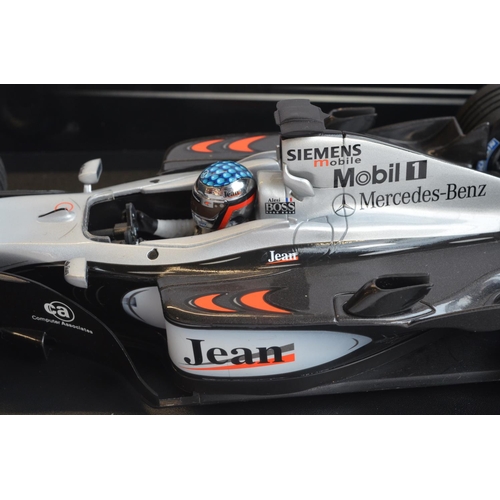 276 - Two boxed Minichamps (Paul's Model Art) 1/18 scale diecast McLaren Mercedes MP4 models to include Vo... 