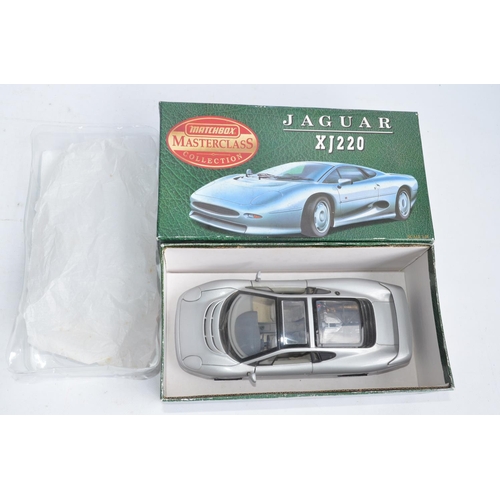 299A - 4x boxed diecast Jaguar model cars to include 3x 1/18 scale Maisto (2x XJ220 and 1x XK180) and a 1/2... 