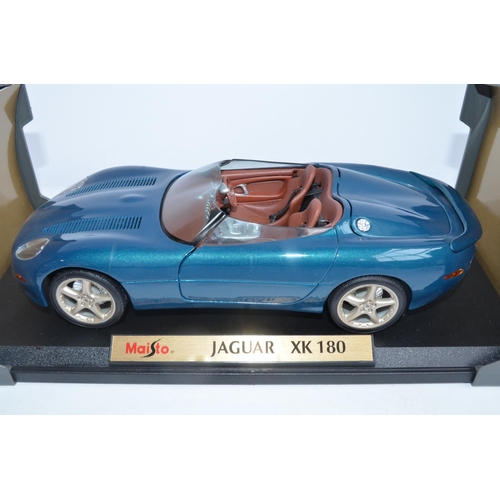 299A - 4x boxed diecast Jaguar model cars to include 3x 1/18 scale Maisto (2x XJ220 and 1x XK180) and a 1/2... 