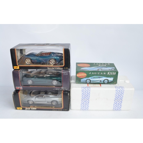 299A - 4x boxed diecast Jaguar model cars to include 3x 1/18 scale Maisto (2x XJ220 and 1x XK180) and a 1/2... 