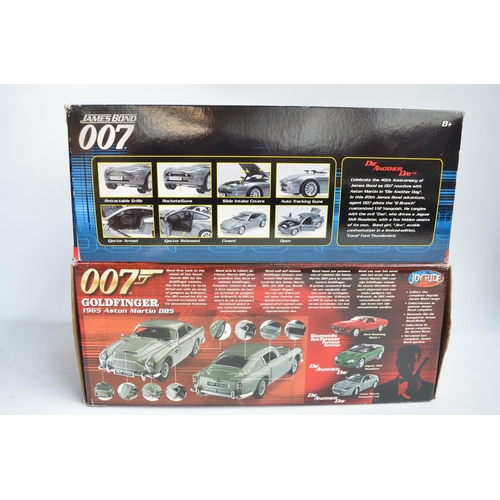 299B - 4x 1/18 scale diecast James Bond related model cars to include Joy Ride 1965 Aston Martin DB5, Paul'... 