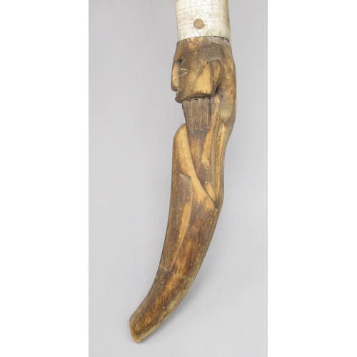 643 - Indonesian bone and hardwood blow dart holder, with ornate 'scrimshaw' work to bone body and figural... 