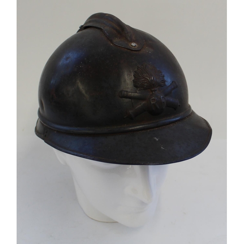 715 - French WWI Adrian model Artillery Helmet. Showing remnants of blue paint. Lacking liner but with one... 