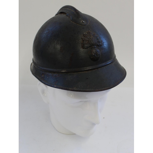 716 - French WWI Adrian Infantry Helmet. Complete with liner and chin strap.