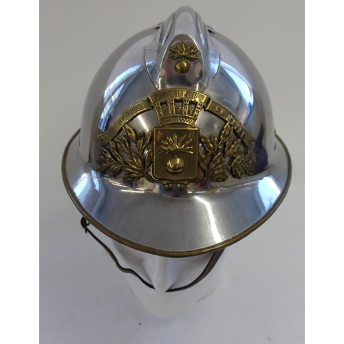 722 - French Fireman's Helmet model 1933. Steel Helmet with brass plate  and brass rim. Complete with leat... 