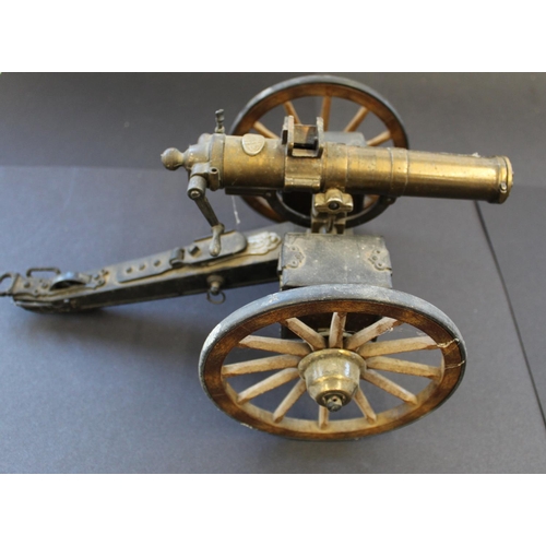 762 - Scale model of a 19th century Gatling. Invented by Richard Gatling in 1861. Scale model of a War shi... 