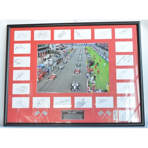 424 - Large framed collection of 21 Formula 1 drivers autographs from The British Grand Prix, Silverstone ... 