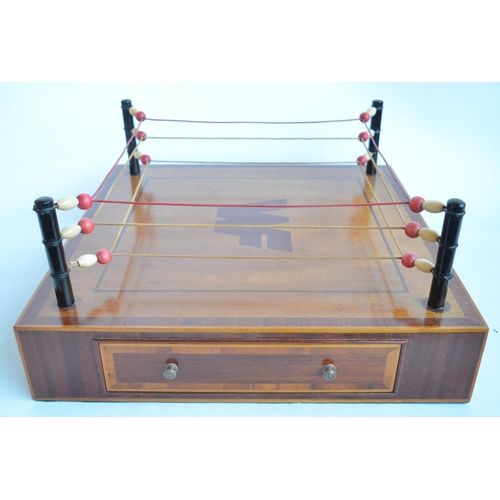 438 - An interesting and well constructed homemade satinwood and mahogany miniature Wrestling Federation w... 