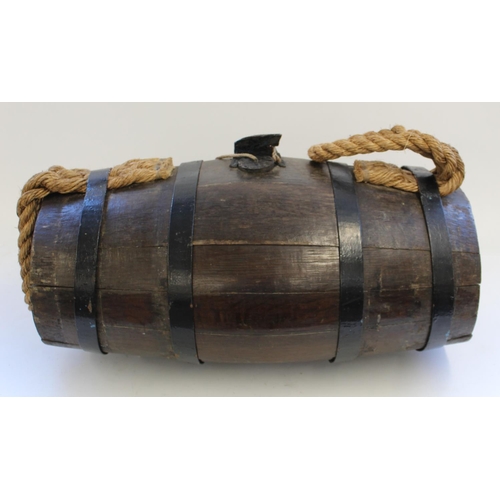 767 - Royal Naval cooped oak Grog barrel with iron hoops, wood bung and rope handles. 61cm wide