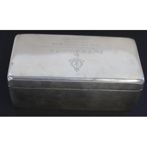 779 - Victoria Cross interest

A hallmarked silver presentation silver cigarette table box with cedar line... 