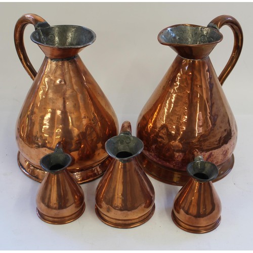 772 - Set of 5 copper measures consisting of x2 Gallon jugs, 1 Pint jug and x2 1/2 Pint jugs, made by Burt... 