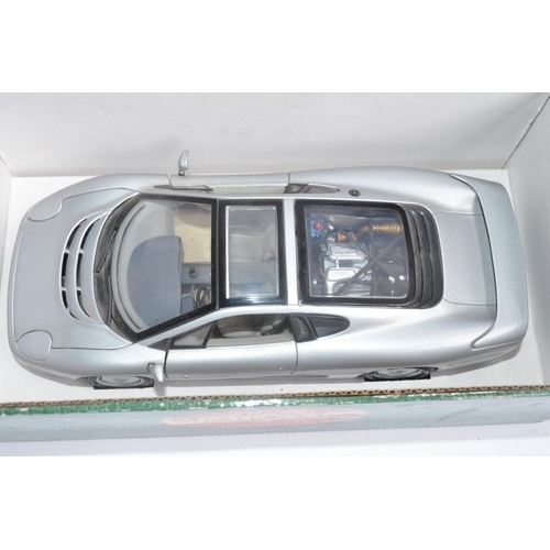 299A - 4x boxed diecast Jaguar model cars to include 3x 1/18 scale Maisto (2x XJ220 and 1x XK180) and a 1/2... 